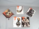 four books of art and sculpture on a white surface