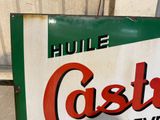 a sign that says castle tavern on the side of the building