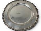 silver plate with beaded edge on a white background