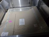 a box that is sitting in the middle of the floor