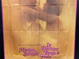 a movie poster for the film, le marbo, featuring a man kissing a woman in front of a