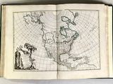 map of the world in a book on a table