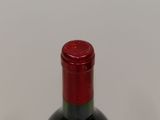 a bottle of wine that is sitting on a table
