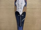 an image of a wooden mask on a wall