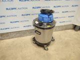an image of a blue and silver trash can sitting in front of a wall