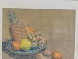 framed painting of fruit and nuts on a plate with a pineapple