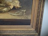 a painting of a dog laying on the ground next to a dead bird