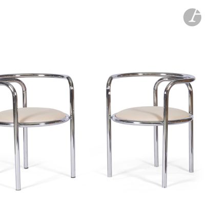 pair of chrome steel and leather armchairs with arms
