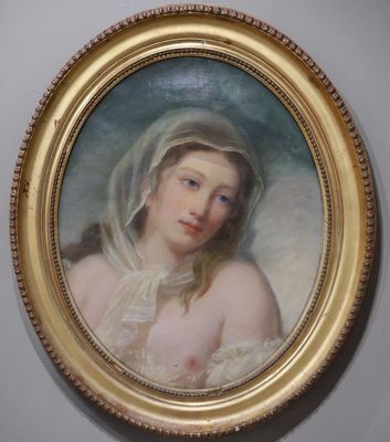 tableau représentant une femme portant un voile sur la tête, dans un cadre doré