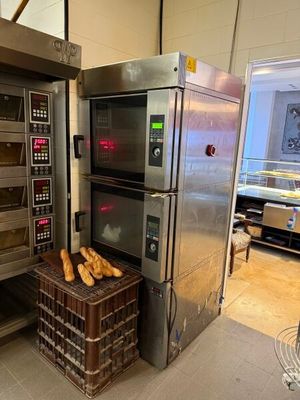 a large oven that has some bread inside of it