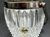 an image of a glass cup with a handle on a table