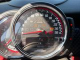 a close up of a speedometer on the dashboard of a motorcycle