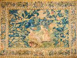 an image of a tapestry hanging on a wall in a room