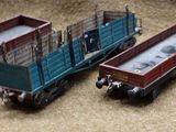 three toy trucks that are sitting on the ground