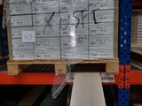 a pallet that has some boxes on it in a warehouse