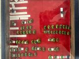 a picture of a display case with a bunch of buttons in it
