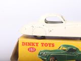 a small toy car sitting on top of a box