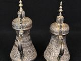 pair of antique silver plated salt and pepper shakers