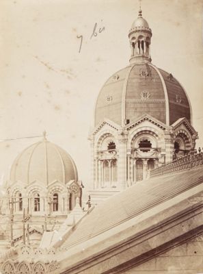 an old photo of a building with a dome on top