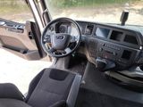 a picture of a car dashboard with a steering wheel