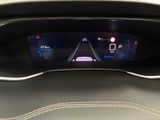 a close up of the dashboard of a car with a digital display