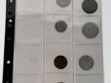 a lot of coins that are in a clear box