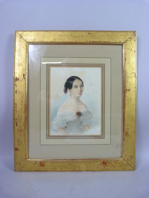 an old picture of a woman in a white dress in a gold frame