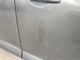 a car door with a hole in the side of it
