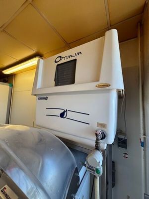 an image of a washing machine inside of a building