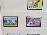 a display of stamps on a shelf in a room