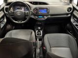 the interior of a small car is clean and ready to be driven