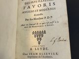 an old book with writing on it sitting on top of a table