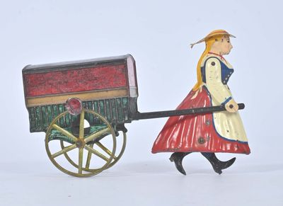 figurine représentant une femme tirant une charrette tirée par un cheval