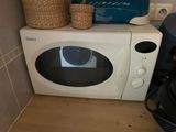 a microwave that is sitting on top of a counter