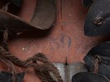 a close up of a pair of shoes and a rope
