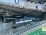 a remote control in the trunk of a car