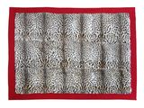 a close up of a leopard print scarf on a white background