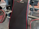 a black and red gym equipment in a gym