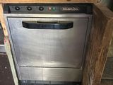 an image of a dishwasher that is in a kitchen