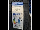 a close up of a tire with a sticker attached to it