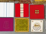 many different types of cloths laid out on a table