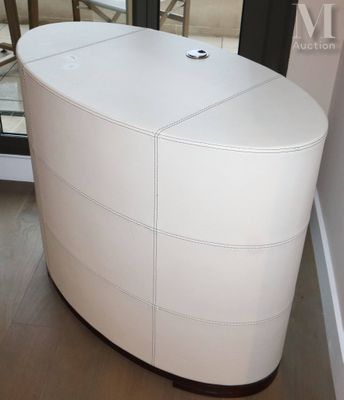 an image of a white chest of drawers in the corner of a room