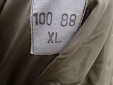 a close up of a military jacket with a number on it