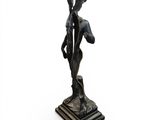 an image of a statue of a man holding a baseball bat