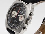 an image of a close up of a watch on a white surface