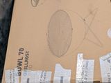 a cardboard box that has some scissors and a pair of scissors on it