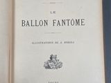 an open book with a black and white image of a ballon fantome on it
