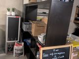 a blackboard on the floor in a garage