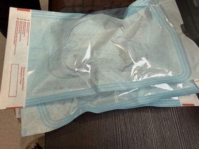 a bag of toilet paper sitting on top of a table