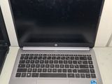 a laptop computer that is sitting on a table